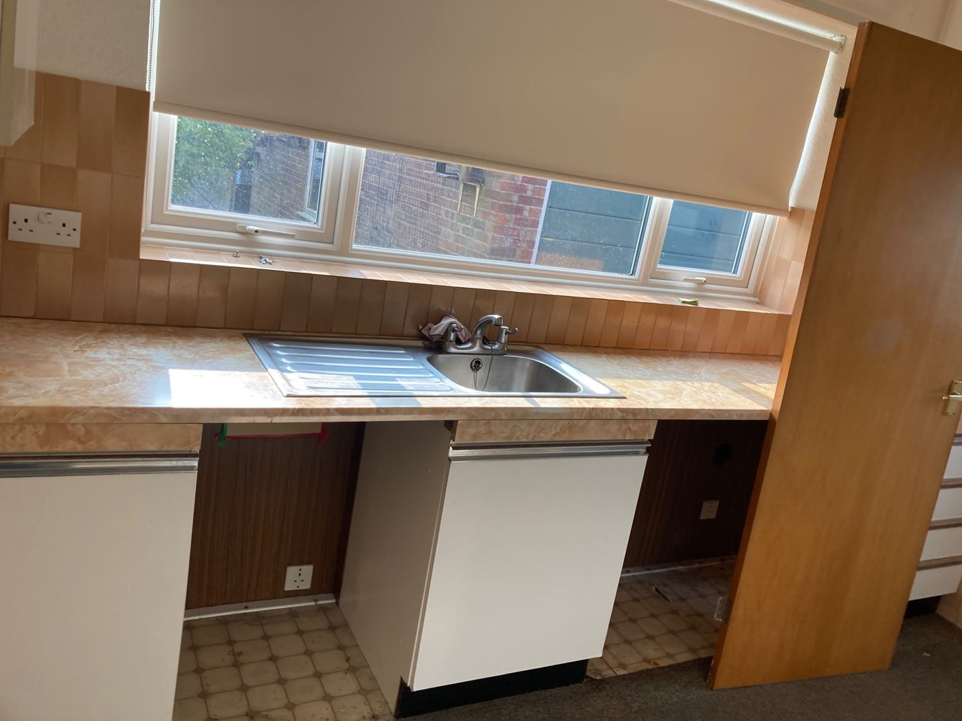 Old kitchen with units still fitted