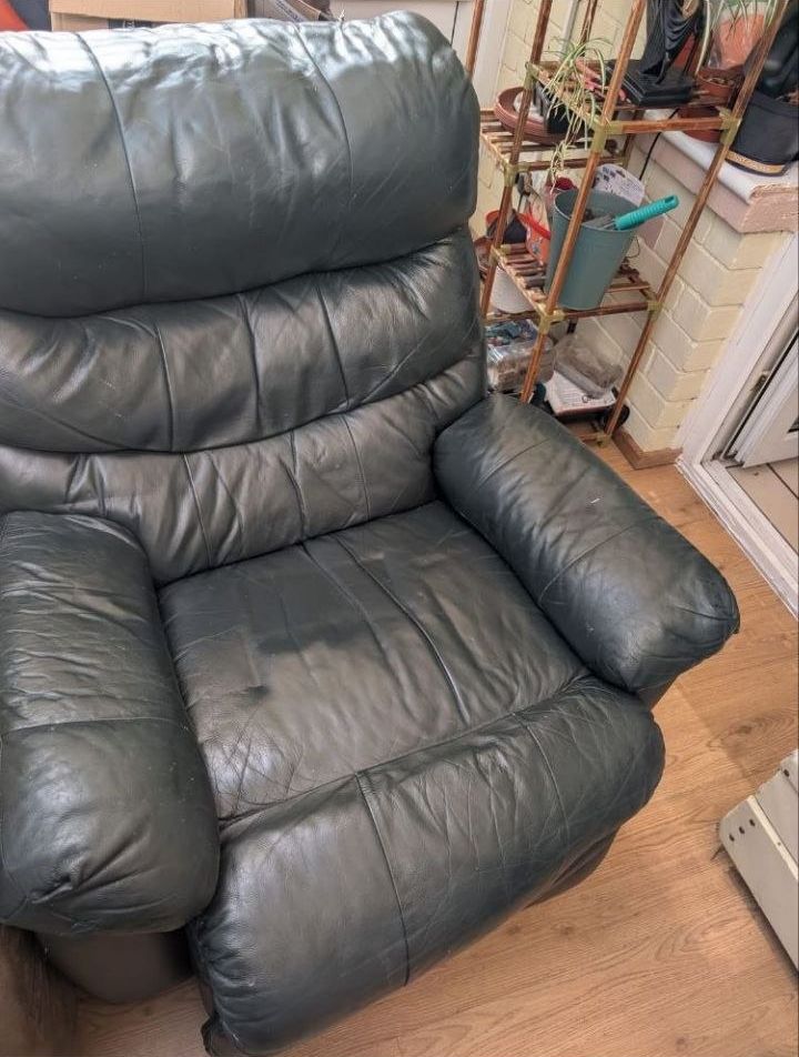 A single leather recliner chair for collection